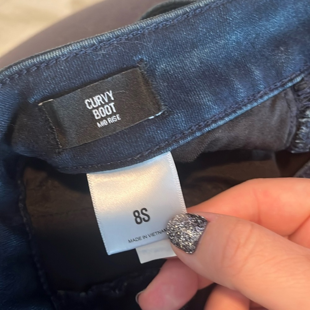 Express curvy boot mid rise  jean, no rips, stains or holes. Like brand new.